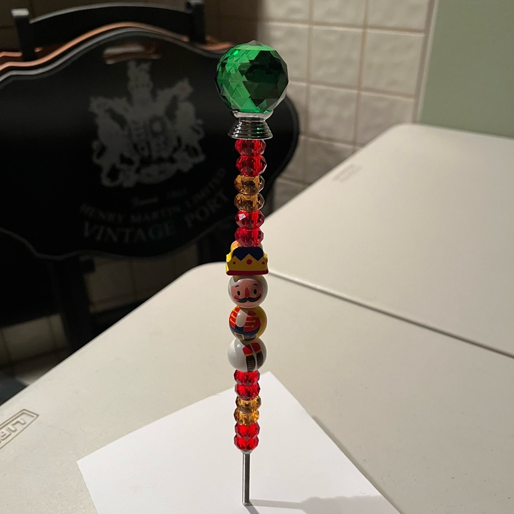 Festive Nutcracker Beaded Ornament. Handmade bought from boutique